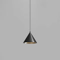 A modern cone-shaped pendant light with a matte black exterior and a brushed gold interior, suspended by a thin black cord against a solid gray background.